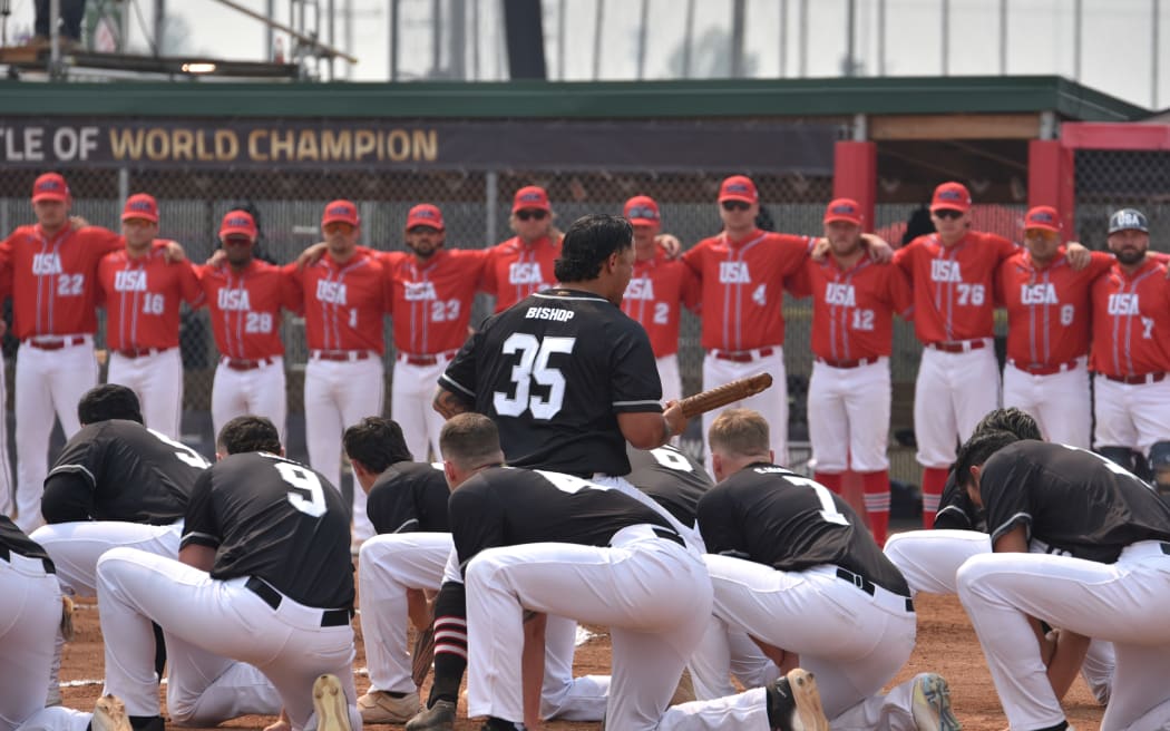 New Zealand Black Sox catcher Te Wera Bishop leads the boys in haka against team USA at the WBSC Mens Softball World Cup, 2025.