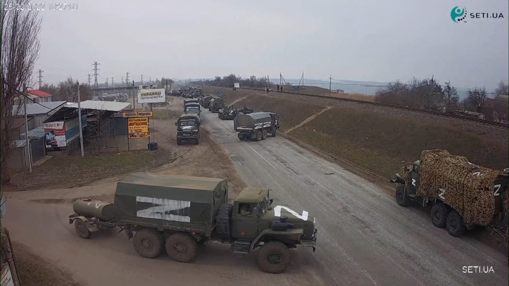 A roadside CCTV footage captured the moment of Russian military vehicles moving in Ukraine's Kherson Region on Friday February 25, 2020 morning.