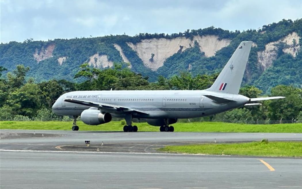 An NZDF Boeing 757 aeroplane on the runway at Port Vila's Bauerfield International Airport, about to take off with the last planned repatriation flight from Vanuatu, on 21 December, 2024, following a major earthquake on 17/12/24.