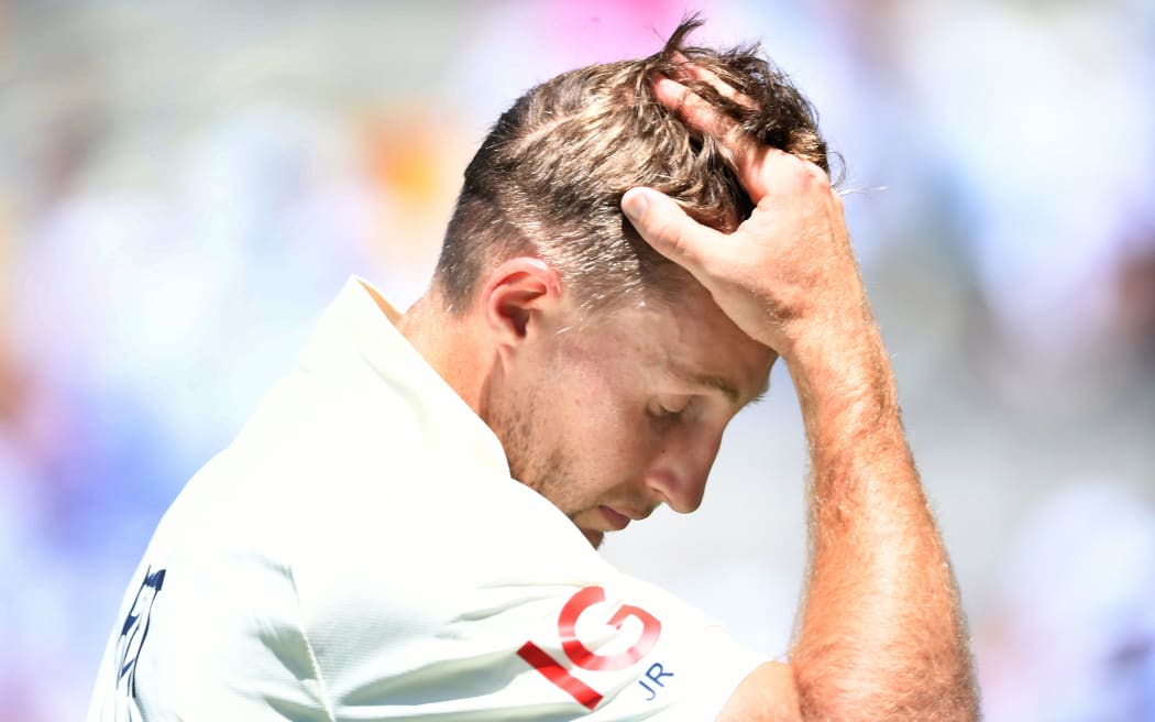 England captain Joe Root reacts.
