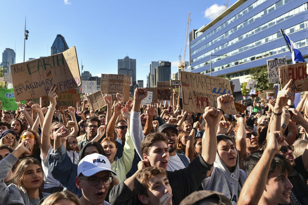 Young activists and their supporters rally for action on climate change in Montreal.