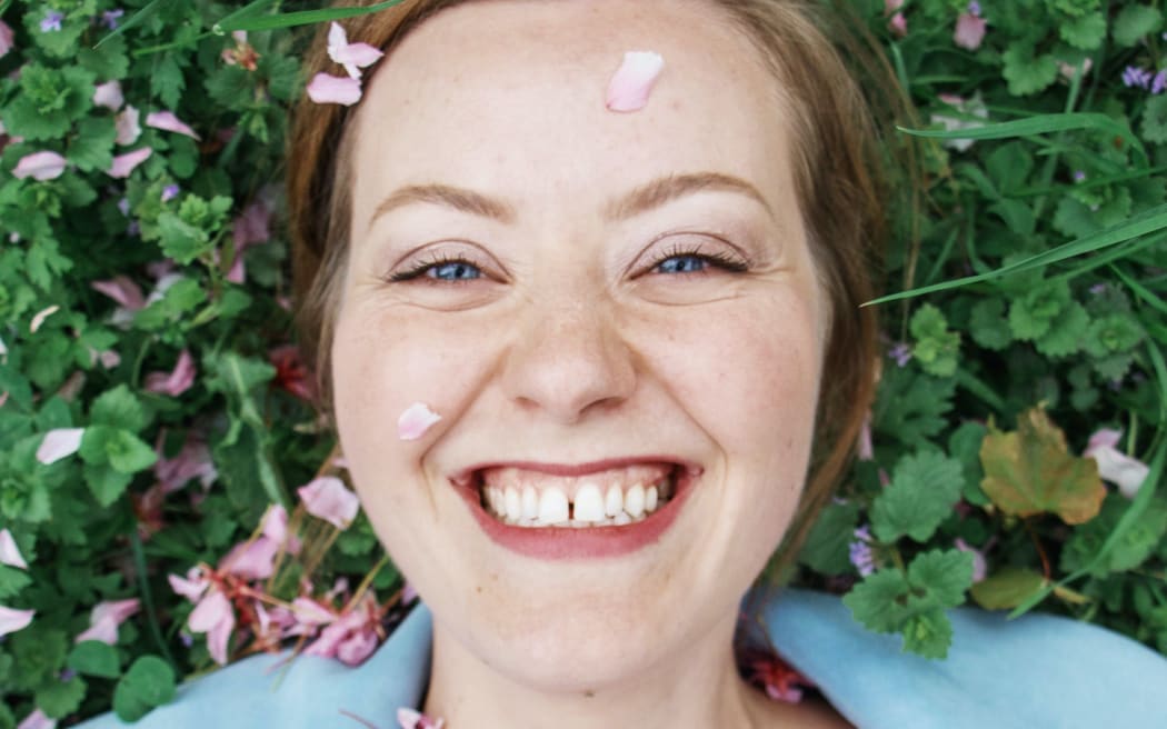 A smiling woman