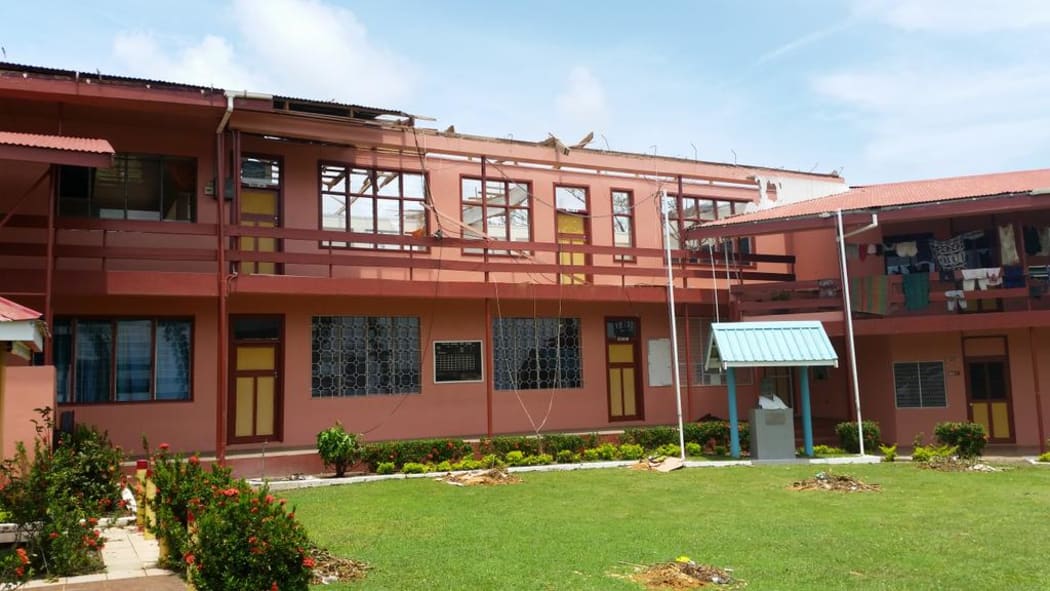 A damaged high school in Fiji's Rakiraki being used as an evacuation centre for eight families.