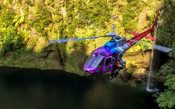 The Trustpower Rescue helicopter winched the pair to safety.
