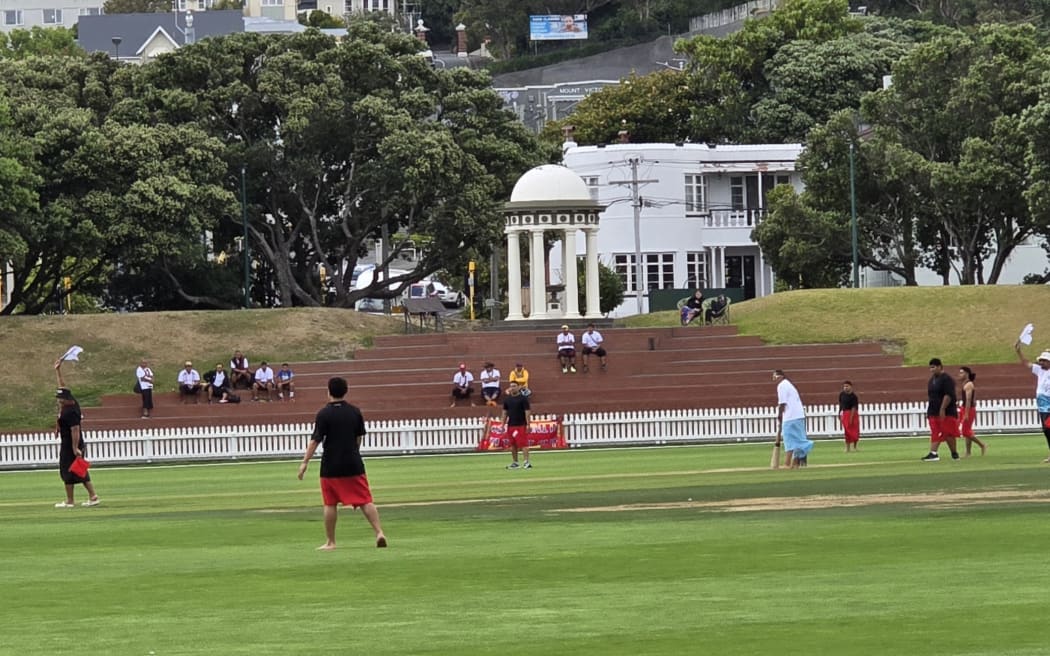 St Patrick's Silverstream (blue and white) and Naenae College (black and red).  Naenae College won on the day.