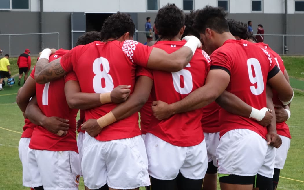 Tonga huddle together during the Oceania Sevens.