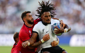 Selestino Ravutaumada of Fiji is tackled by Giorgi Kveseladze of Georgia during the Rugby World Cup France 2023 match between Fiji and Georgia at Nouveau Stade de Bordeaux on 30 September, 2023 in Bordeaux, France.