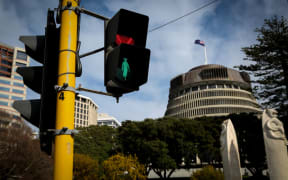 Kate Sheppard crossing outside the Beehive.