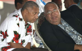 Ratu Joni Madraiwiwi (right) with Frank Bainimarama in 2006. Ratu Joni was a politician, lawyer and vice-president of Fiji from 2004 to 2006.
