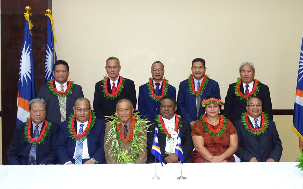 President David Kabua, seated third from left, with his Cabinet, including Education Minister Kitlang Kabua, seated second from right