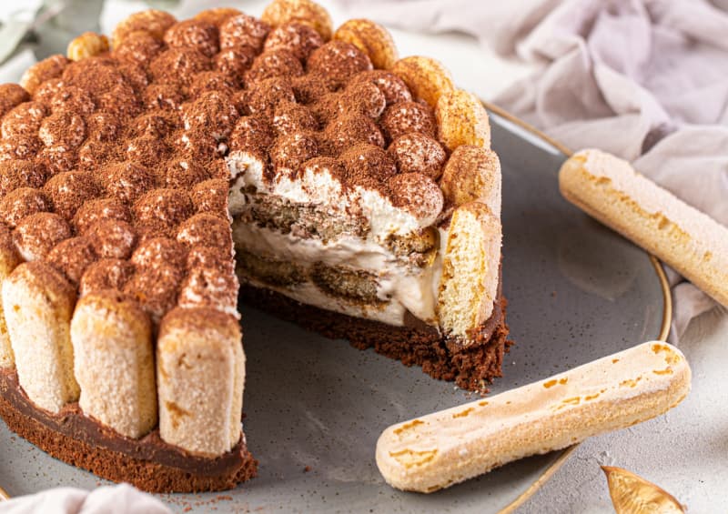 Tiramisu - an an Italian dessert known as 'pick me up' - is traditionally made with ladyfingers dipped in coffee, egg yolks, sugar, mascarpone, and cocoa powder.