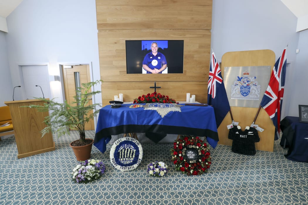 The coffin of New Zealand-born Metropolitan Police officer Sergeant Matt Ratana is surrounded by floral tributes ahead of his funeral service in Shoreham-by-Sea, south England.