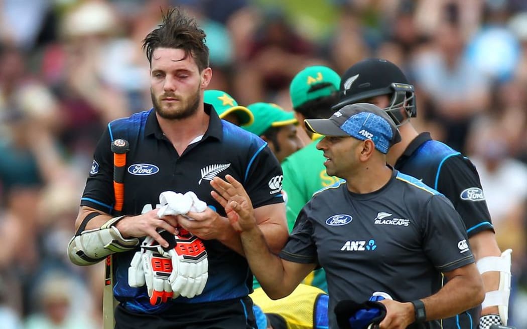 Mitchell McClenaghan is forced from the field injured during the ODI against Pakistan at the Basin Reserve, Monday 25th January 2016. Copyright Photo.: Grant Down / www.photosport.nz