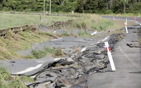 SH25 is open between Hikuai and Tairua as floodwaters have receded. The force of the water has shaved off the top layer of the road at one part just north of Hikuai. Large chunks of the road lay in the ditch next to where they used to be.