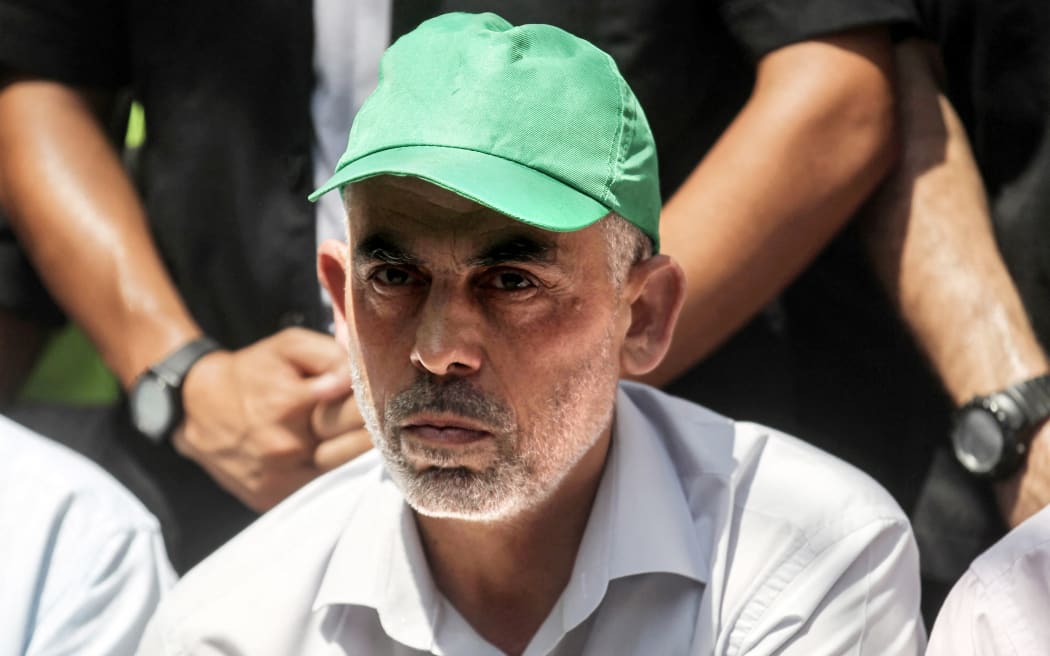 The head of the Hamas movement in Gaza Yahya Sinwar attends a gathering in the southern Gaza Strip city of Khan Yunis on July 22, 2017, as demonstrators protest against Israeli security measures. - An Israeli security official told AFP on October 17, 2024 that the military was conducting a DNA test on a militant's body to confirm whether it was Hamas chief Yahya Sinwar. (Photo by SAID KHATIB / AFP)