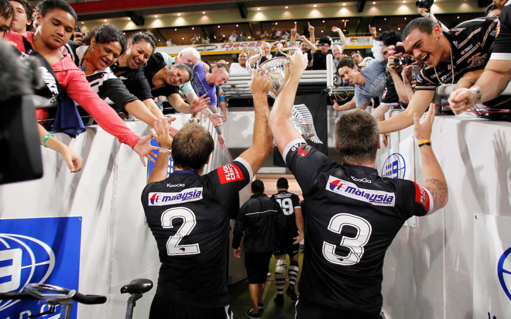 New Zealand players celebrate their historic victory. Four Nations Rugby League Final - Kangaroos v Kiwis, 13 November 2010.