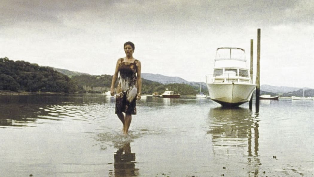 Movie still from the 2001 New Zealand feature film Rain featuring Sarah Peirse.