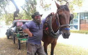 Lewis Stanton outside the Nelson courthouse with Barney.