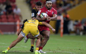 Taniela Tupou on the charge against the Hurricanes.