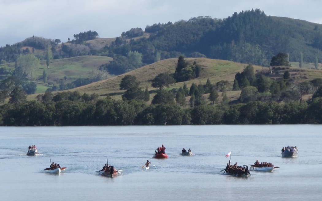 Waka on Hokianga Harbour during previous Treaty commemorations at Mangungu.