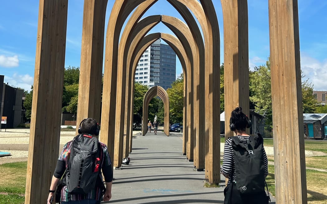 UC Arts Digital Lab manager Kaspar Middendorf and Our Stories director Kris Herbert test the Earthquake Stories Walk, which was developed to bring the CEISMIC audio archive to life in the central city.