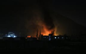 Smoke billows on the outskirts of the Syrian capital Damascus following Israeli airstrikes on December 9, 2024. - Israel conducted more than 100 air strikes on military targets in Syria on December 9 including a research centre Western countries suspected of having links to chemical weapons production in Damascus, a war monitor said. (Photo by Aaref WATAD / AFP)