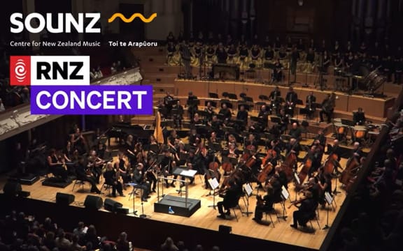 An orchestra prepares to perform on stage. This is from the debut performance of Victoria Kelly's Requiem performed by the Auckland Philharmonia at the Auckland Arts Festival 2022