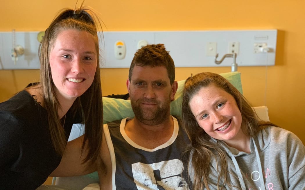 Blair Vining and his daughters Lily and Della-May