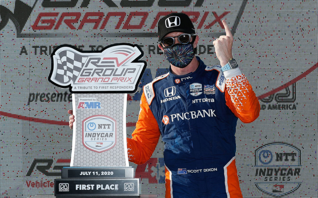 #9: Scott Dixon, Chip Ganassi Racing Honda, celebrates on the podium