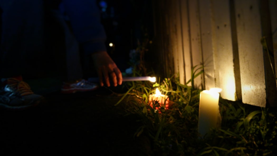 More than 30 family and friends gathered for the vigil outside the home where Maggie Renee Watson was found.