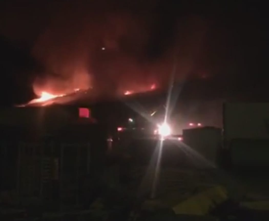 A screenshot from a Facebook Live video of the fire posted by Gisborne mayor Meng Foon