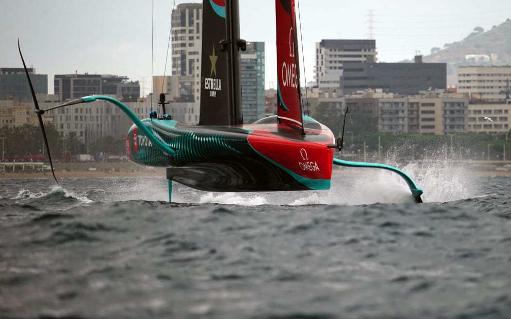 Defender Emirates Team New Zealand competes on day 1 of the Louis Vuitton 37th America's Cup Match against Britain's Ineos Britannia (not seen) off the coast of Barcelona on October 12, 2024. (Photo by Manaure Quintero / AFP)