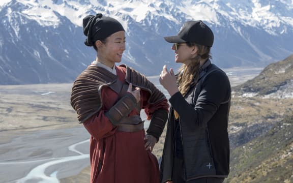 Niki Caro (right) on the set of Mulan