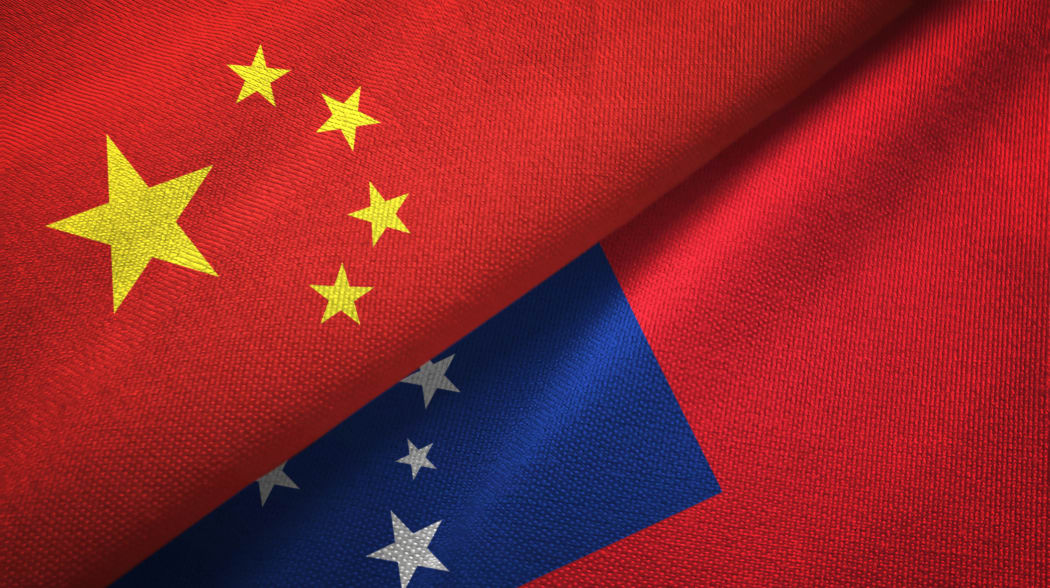 China and Samoa two folded flags together