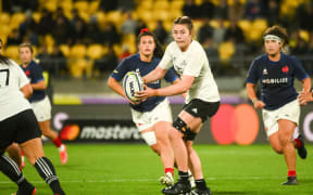 Maiakawanakaulani Roos of the Black Ferns makes a pass, playing against France in the WXV1 women’s rugby match at Sky Stadium, Wellington.