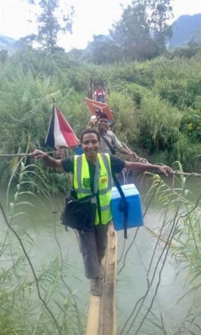 Delivering vaccinations in PNG