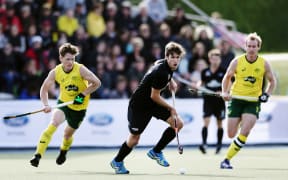 Black Sticks striker James Coughlan in action against Australia