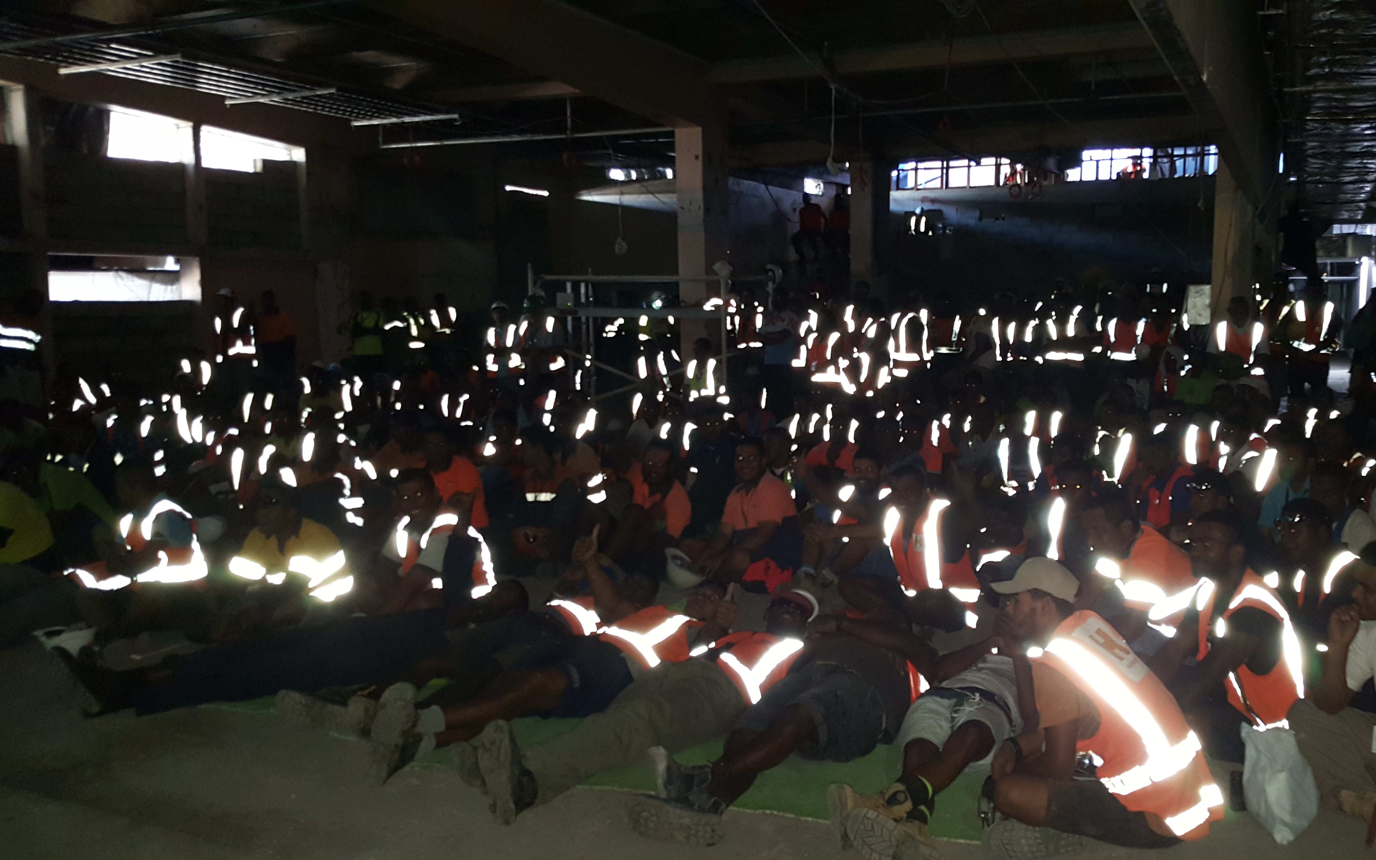 Fijians watch the Olympic sevens final at Nadi Airport
