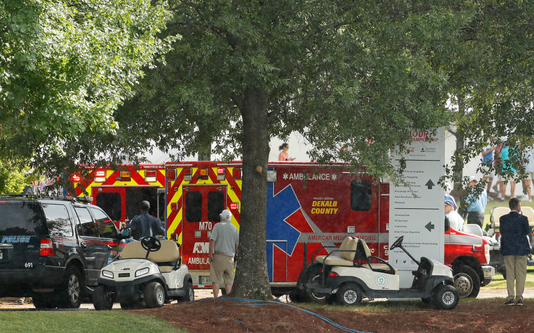 ATLANTA, GEORGIA - AUGUST 24: Emergency services provide assistance after a lightning strike during a suspension of the third round at East Lake Golf Club on August 24, 2019 in Atlanta, Georgia.