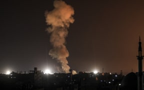 Smoke billows during Israeli bombardment in Rafah on the southern Gaza Strip on February 6, 2024 amid ongoing battles between Israel and the Palestinian militant group Hamas. (Photo by Mahmud Hams / AFP)