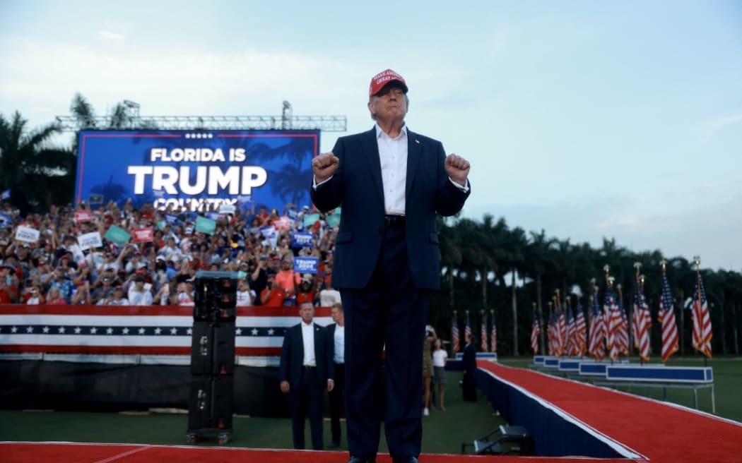 DORAL, FLORIDA - JULY 09: Former President Donald Trump arrives for his campaign rally at the Trump National Doral Golf Club on July 09, 2024 in Doral, Florida. Trump continues to campaign across the country.   Joe Raedle/Getty Images/AFP (Photo by JOE RAEDLE / GETTY IMAGES NORTH AMERICA / Getty Images via AFP)