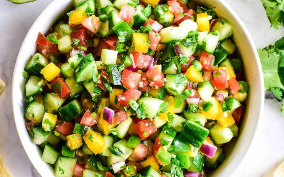 salsa made with tomatoes, cucumber and capsicum