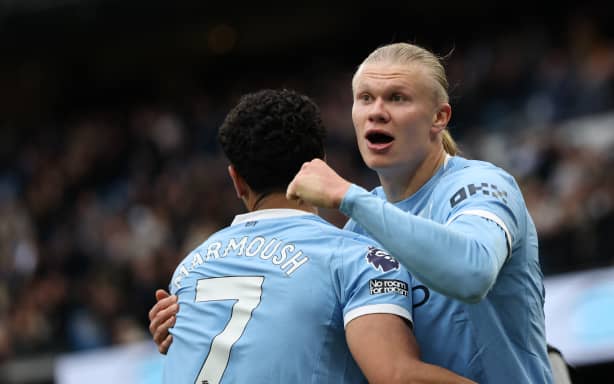 Manchester City's Norwegian striker Erling Haaland celebrates a goal.