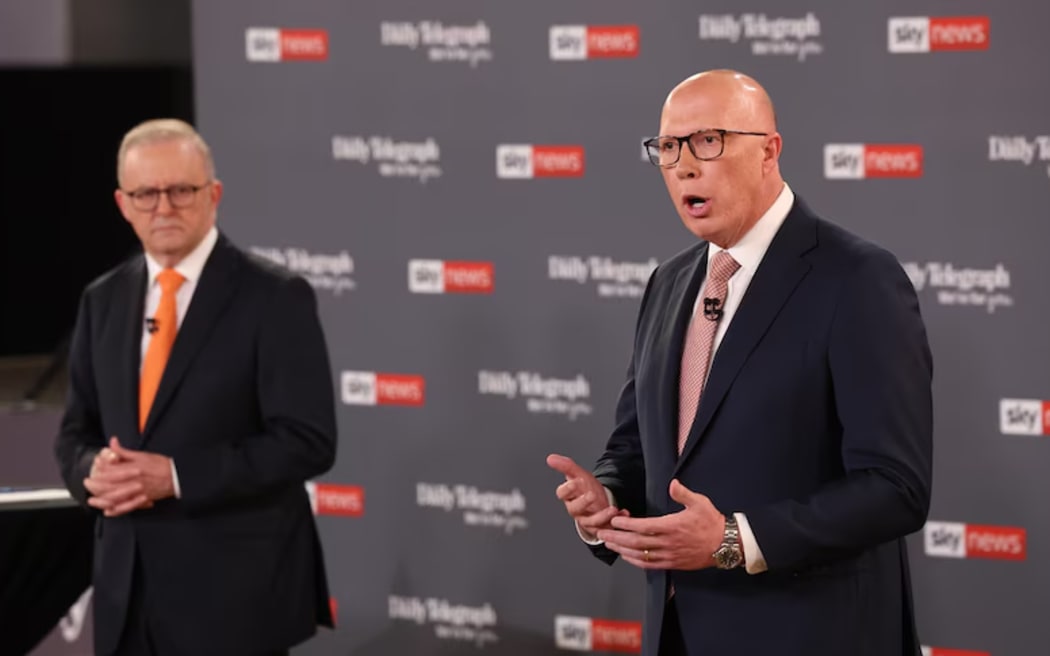 Australia Prime Minister Anthony Albanese, left, and Peter Dutton at the leaders debate 8 April 2025.
