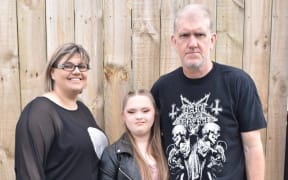 Tarryn Attwell (centre) suffers from chronic pain and her family is struggling to find help.
