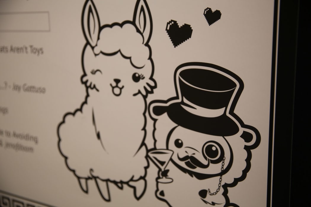The mascots of Kiwicon 7: The grass mud horse and the sheep