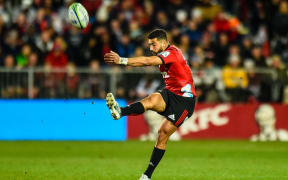 Richie Mo'unga of the Crusaders kicks the ball during the Super Rugby Final 2018.