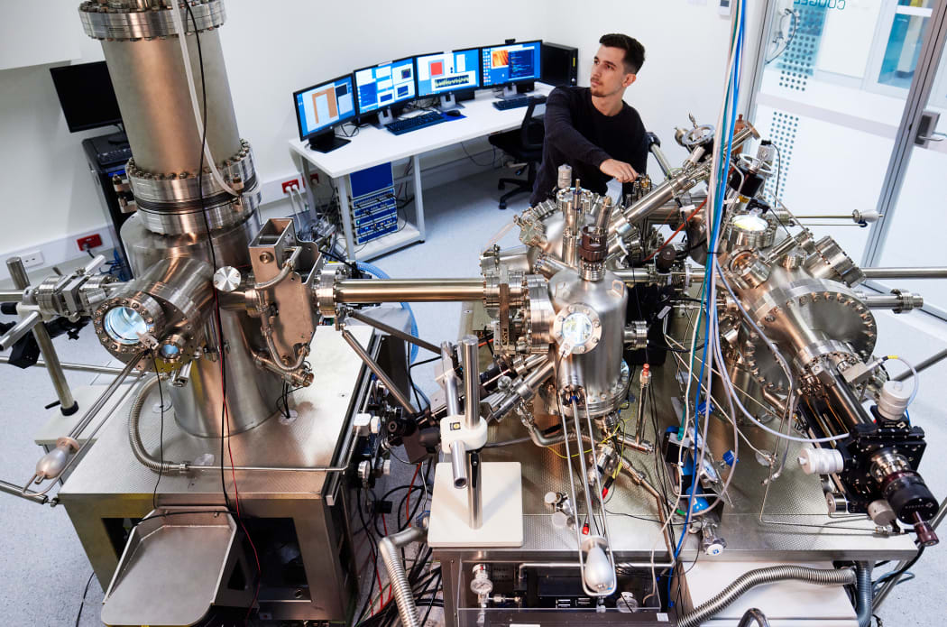 A Silicon Quantum Computer engineer operates one of their Scanning Tunnelling Microscopes to fabricate a quantum processor with atomic precision.