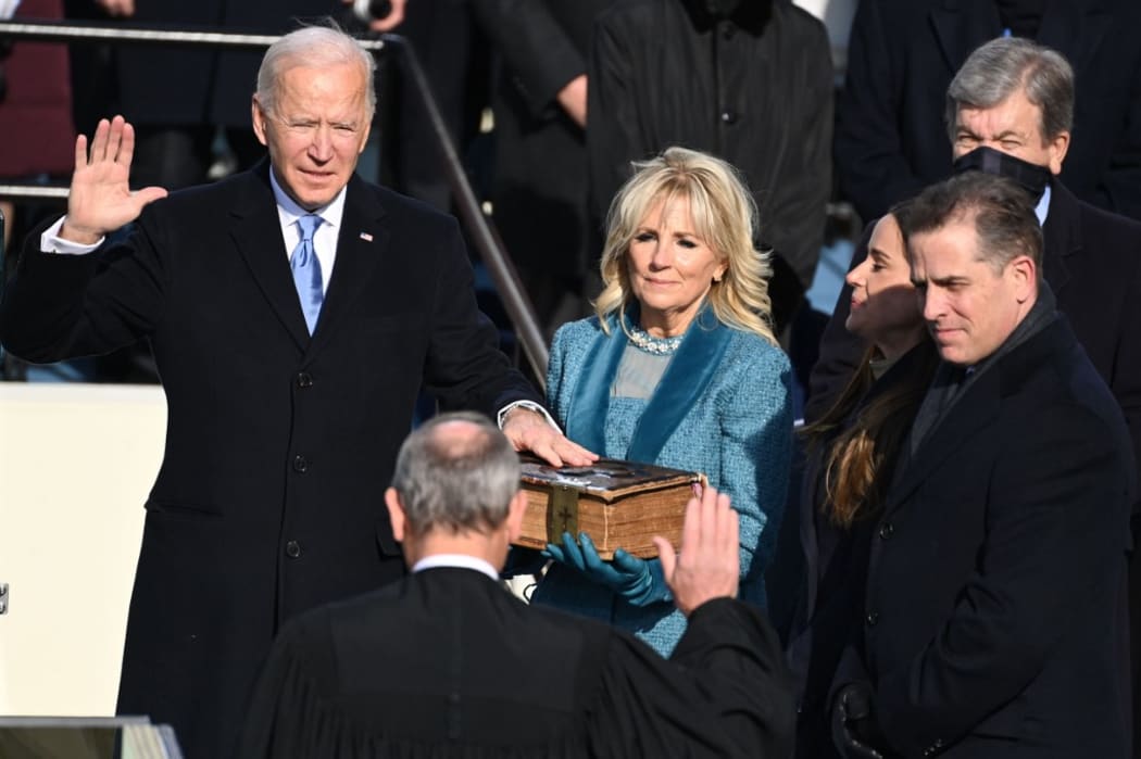 Joe Biden is sworn in as the 46th US President by Supreme Court Chief Justice John Roberts on January 20, 2021, at the US Capitol in Washington, DC. (Photo by SAUL LOEB / POOL / AFP)
