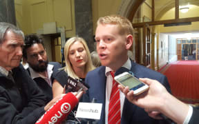 Chris Hipkins talks to media.